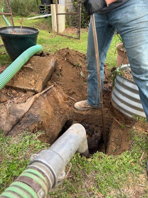 Hinson crew clearing a drain line